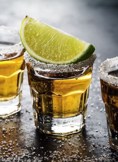 tequila shot with salted rim and lime